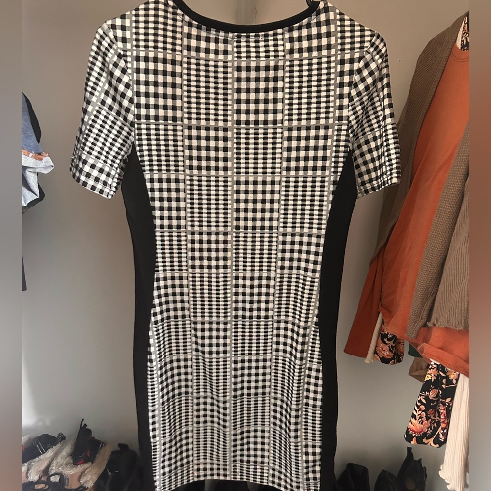Checkered dress, great for the office. Gives you a nice little booty too.